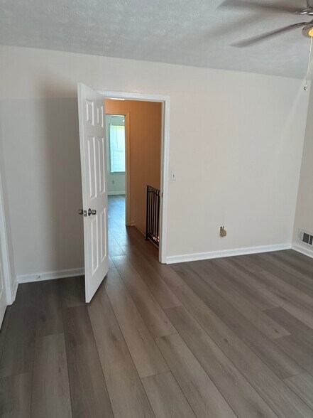 Master Bedroom with two closets. Waterproof laminates throughout upstairs. - 2640 Evans Mill Dr