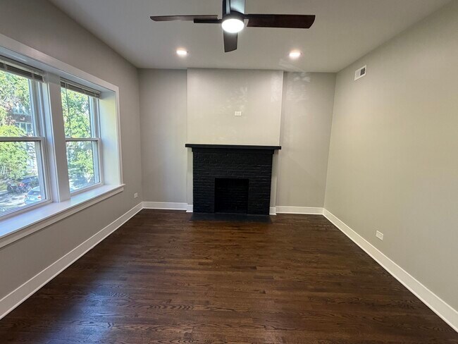 Building Photo - 7823 S Colfax Ave