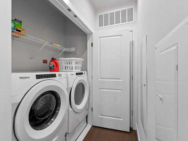 Building Photo - Discover Modern Comfort at Wind Charm Street