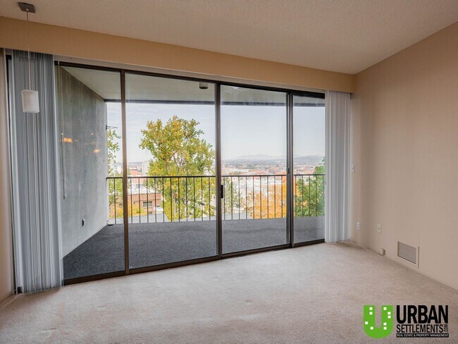 Building Photo - Spacious 2 Bedroom, 2 Bath Condo with Mode...