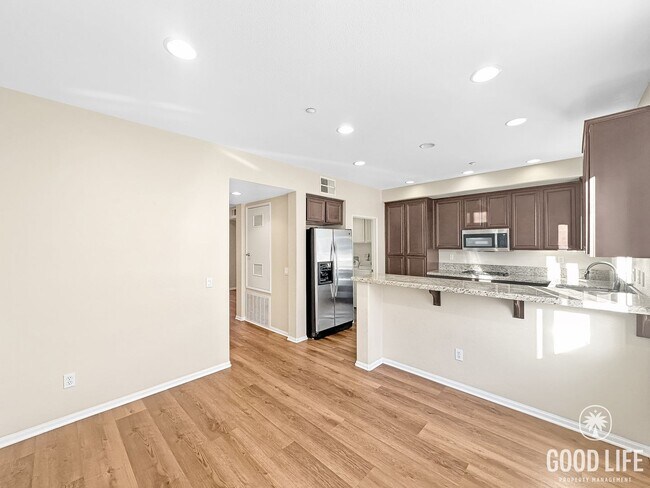 Building Photo - Modern 3-Story Townhome in Bay Park – 3BR/3.5BA with Pool, Balcony & In-Unit Laundry