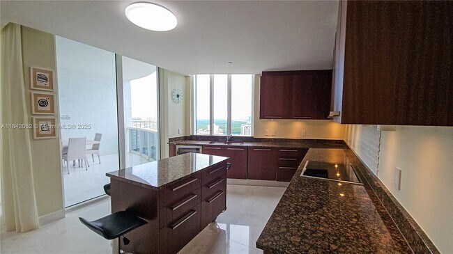 Building Photo - 15901 Collins Ave
