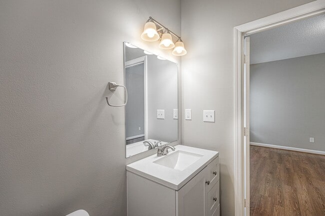 Building Photo - Like New Home off Freeman Mill.  Just Painted, New Wood/Vinyl Flooring, Vaulted Ceilings, Front P...