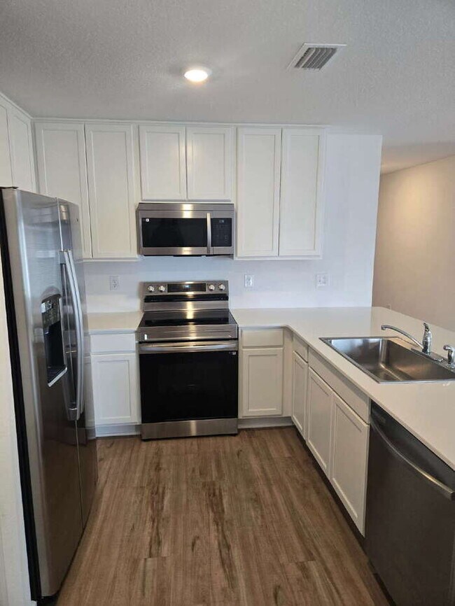 Building Photo - Welcome to your brand-new home in the Mallard Landing conveniently located to NAS Pensacola! INTE...