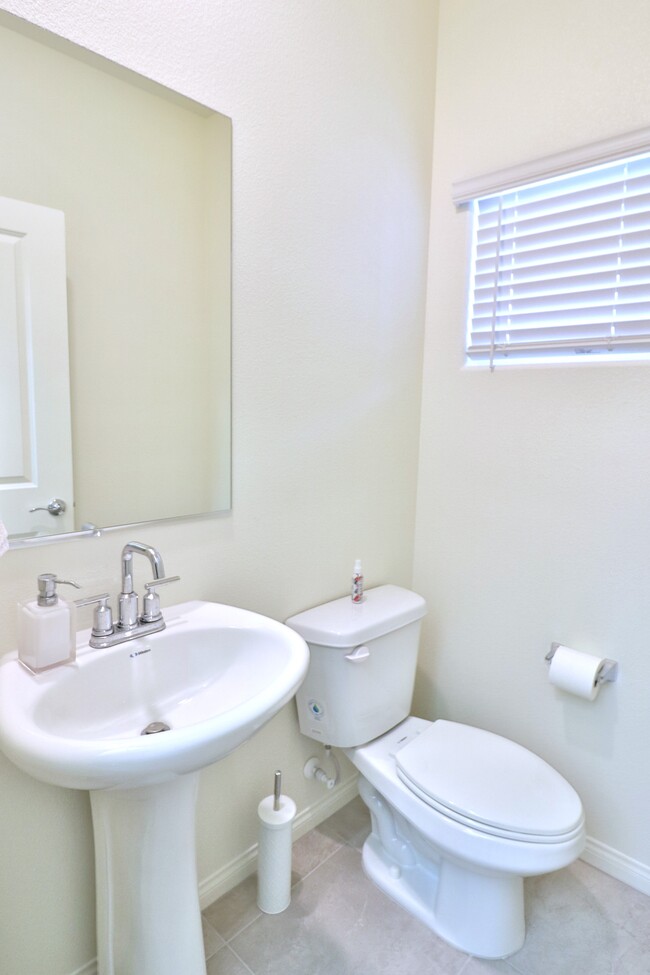 Half bath downstairs - 7231 Alabaster Peak St