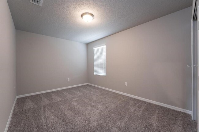 Building Photo - 5252 Sanders Oak Trl