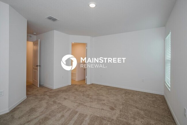 Building Photo - 4 Bedroom Pet-Friendly Home in Mascotte, FL with Main Street Renewal
