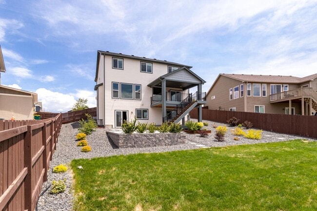 Building Photo - Spacious 5-Bedroom Home with Finished Base...