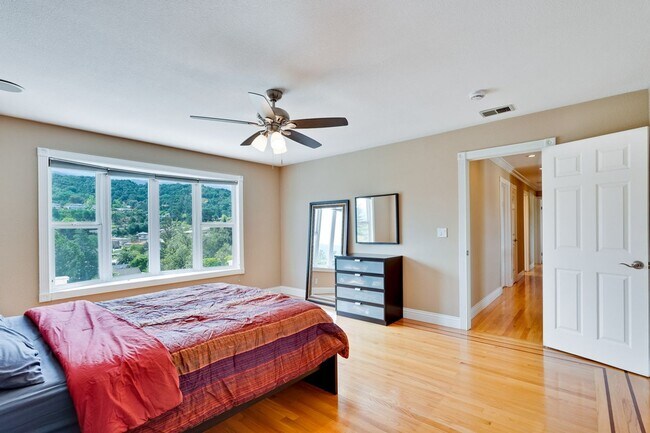 Building Photo - Remodeled 5 Bedroom Home with Heated Pool, Hillside Views, Solar, and Sunrise and Sunset Views in...