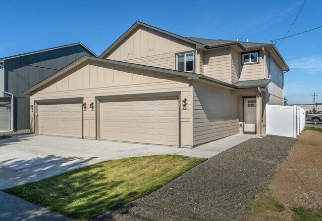 Main entrance and double car carage - 7229 E Pacific Way