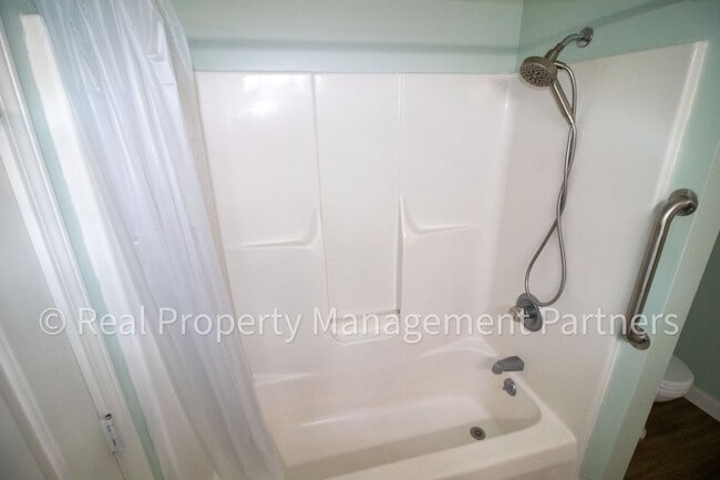 Building Photo - Forest Hills 3 Bed Townhome with Garage, Pond View and Some Utilities Included