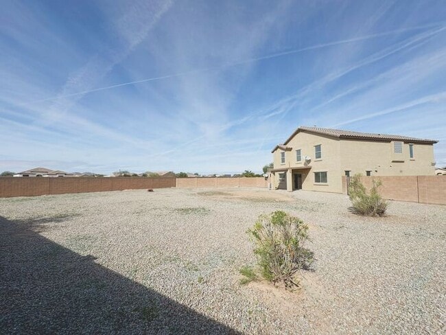 Building Photo - 4BR / 2.5BA Home with Expansive Lot – 2-Car Garage, Community Pools & Golf