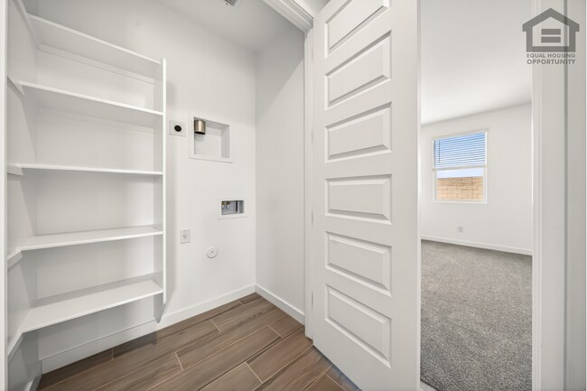 Building Photo - 4Bed/3Bath House at Thomas Rd/99th Ave! Ready for Immediate Move-In! -- Mother-In-Law Suite W/Pri...