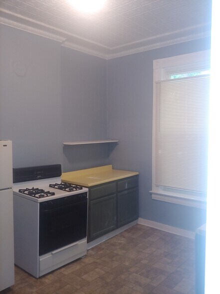 Refrigerator and gas stove included extra cabinet space in kitchen - 310 Fairbanks Ave