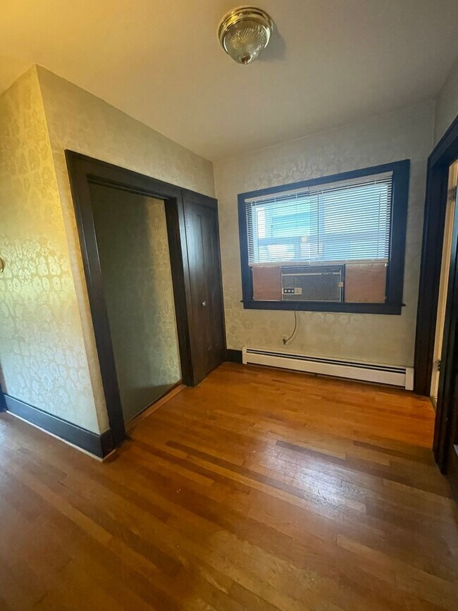 Building Photo - One Block to the Diag! Charming Home with Private Courtyard + Parking