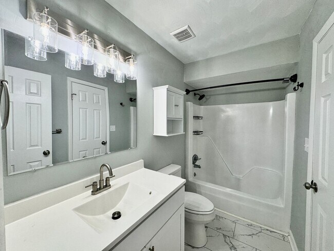 Building Photo - Updated & Ready For You On 12-05-25! A Pet-Friendly Home w/Attached Garage, All Appliances Convey...