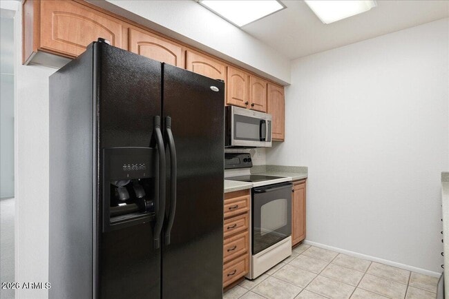 Building Photo - 9907 W Cedar Dr