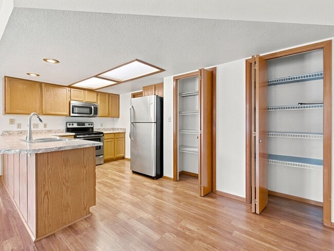 Building Photo - Spacious 2BR Rental with Open Floor Plan & Low-Maintenance yard
