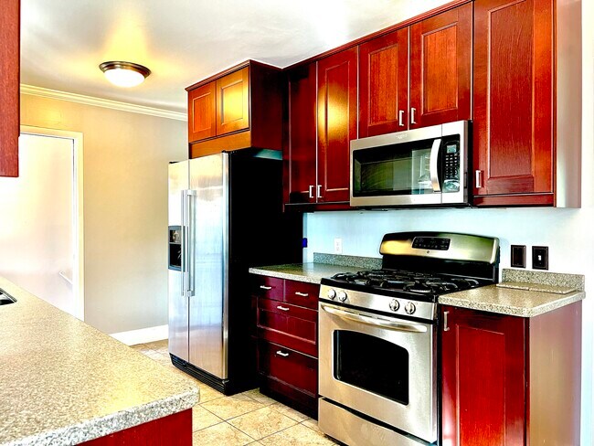 Fully updated kitchen with new appliances, cabinets and countertops - 3096 S Marie Cir