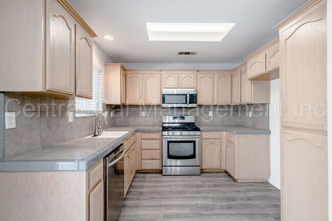 Building Photo - 3 Bedroom/2 Bath with a Pool and Solar - $...