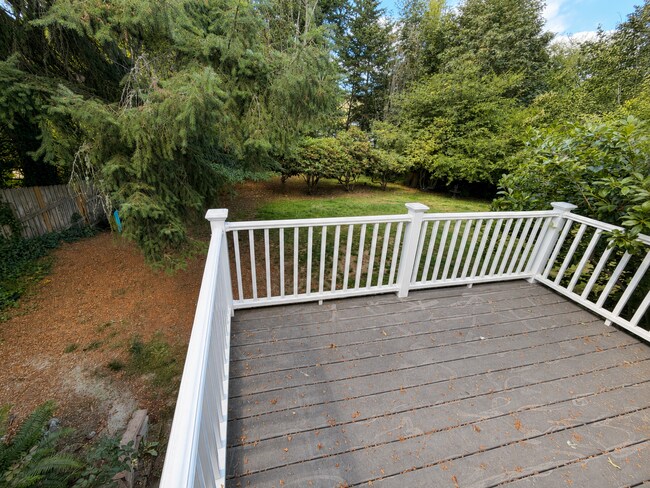Building Photo - Beautiful Split-Level Home with Fireplace, Deck, Garage, and EV Charger