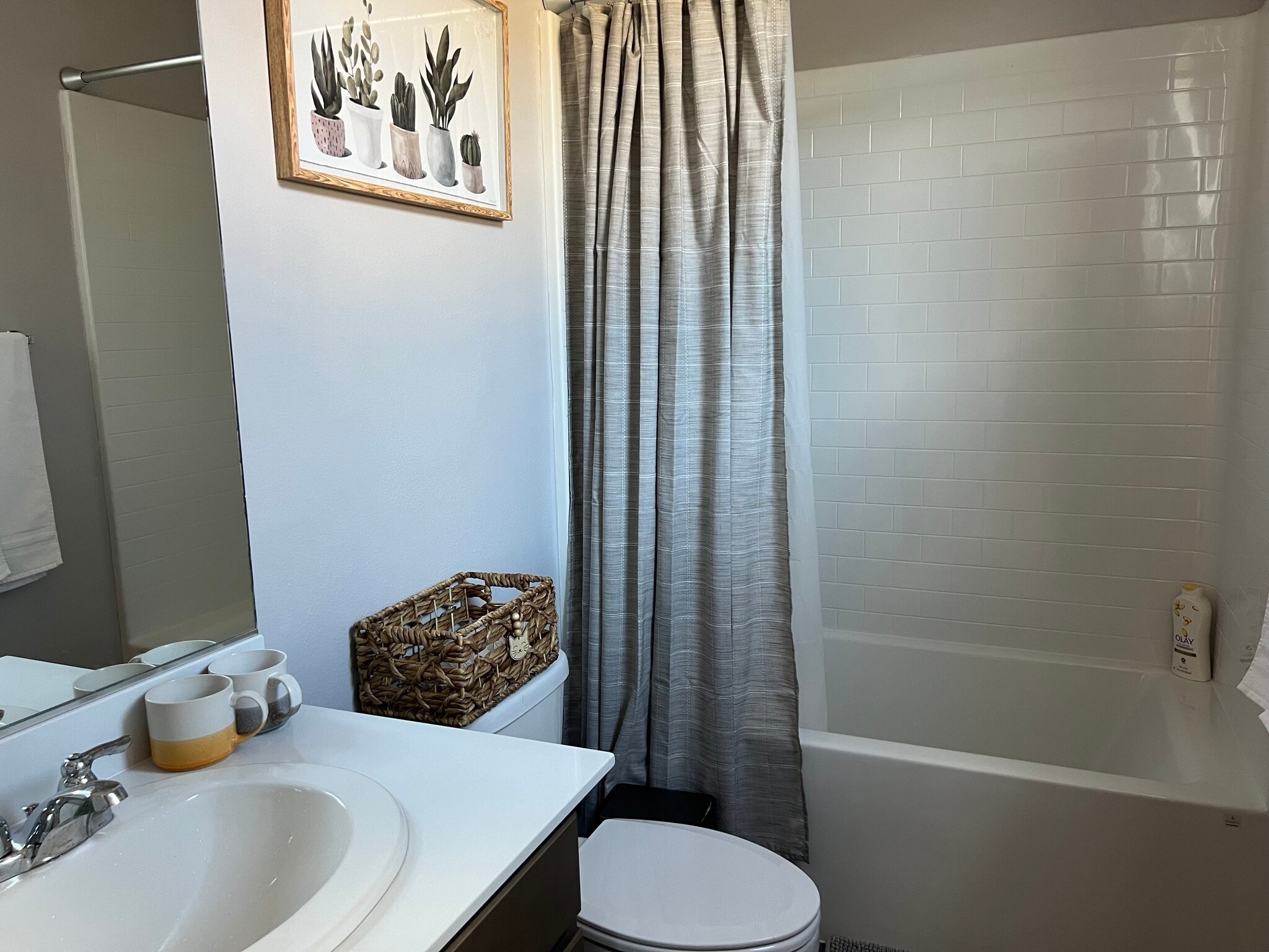 full bathroom with a tub - 32914 Guinness Way