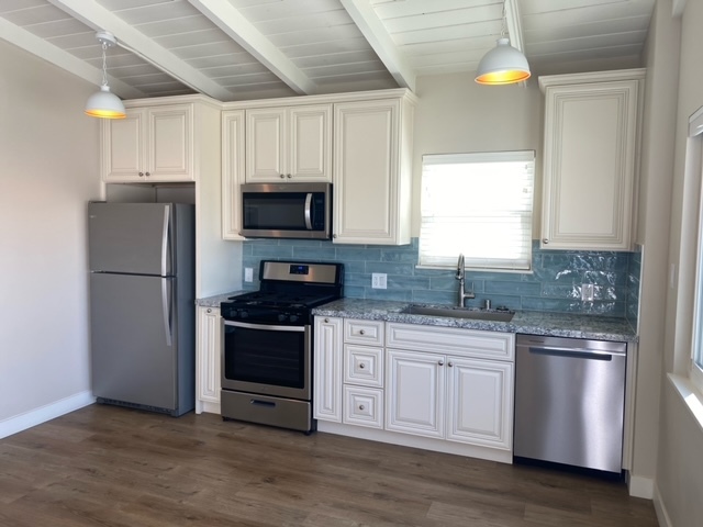 Remodeled kitchen with stainless steel appliances. All pictured appliances included. - 210 30th St