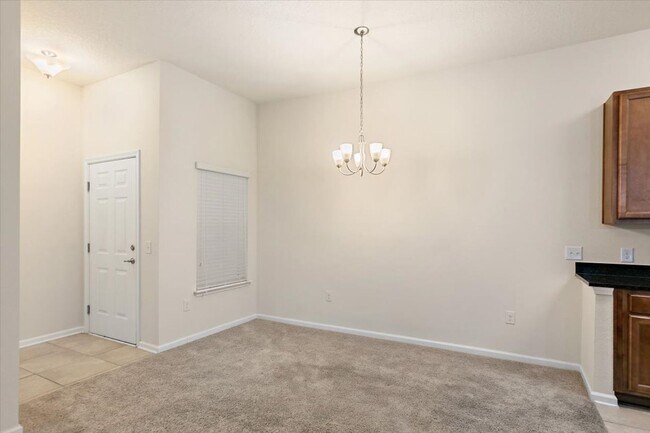 Building Photo - Spacious 2/2 Condo located in the highly s...
