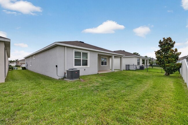 Building Photo - 4 Bedroom in Gated Community!
