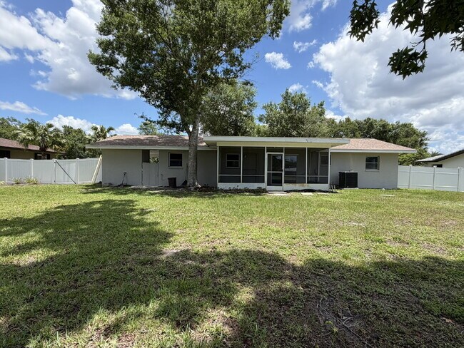 Building Photo - "Charming 3-Bedroom Home with Gleaming Hardwood Floors!"
