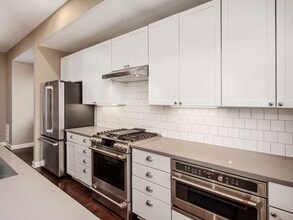 Building Photo - Luxury Living at Four X Five Condos