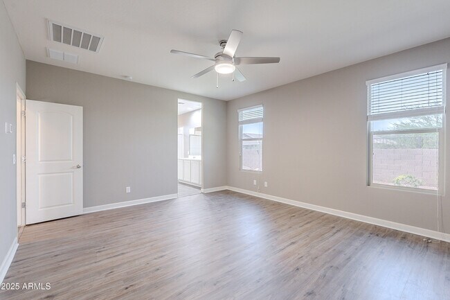 Building Photo - 13606 W Desert Moon Way