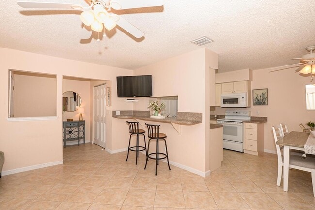 Building Photo - 3970 NW Cinnamon Tree Cir