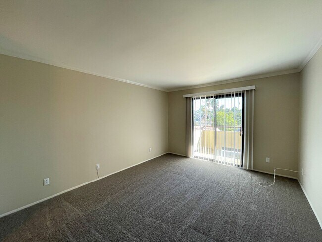 Building Photo - $500 Move In Special-Spacious Condo with Dual Master Suites Just Minutes Away from SDSU