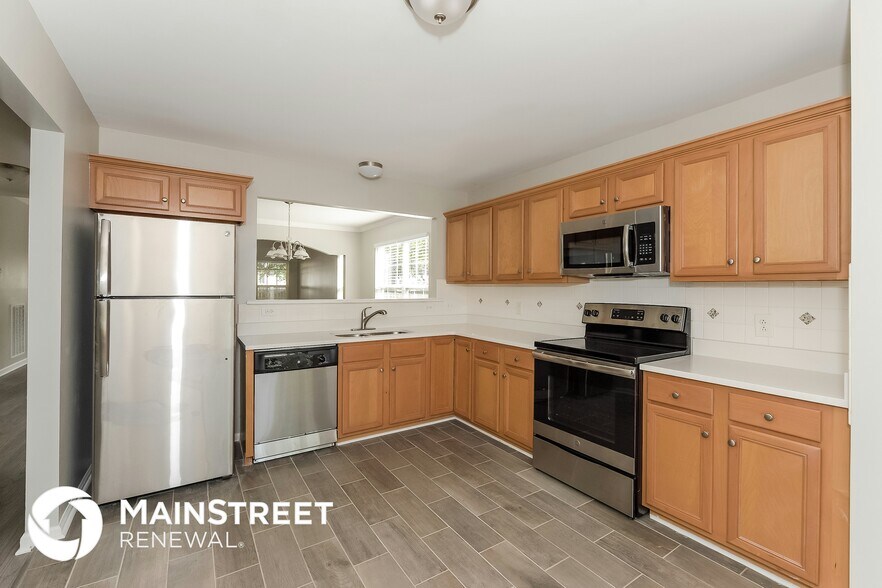Building Photo - 6412 Paddington Way