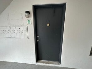 Building Photo - Green Tee - # 202