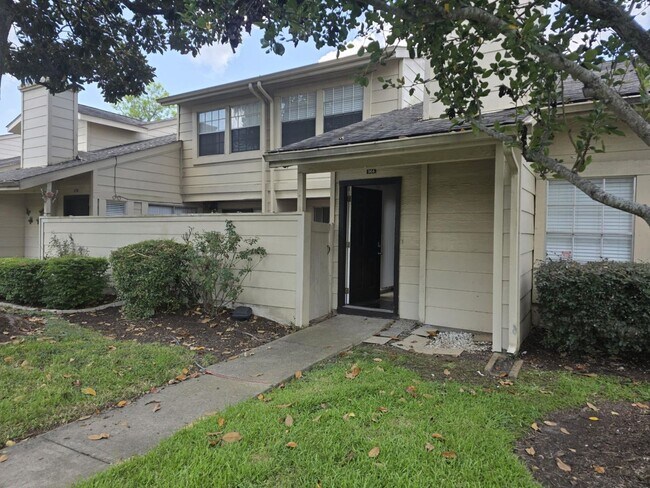 Building Photo - Beautifully Updated 2BR/2BA with Loft Oasis – Safe & Gated Community