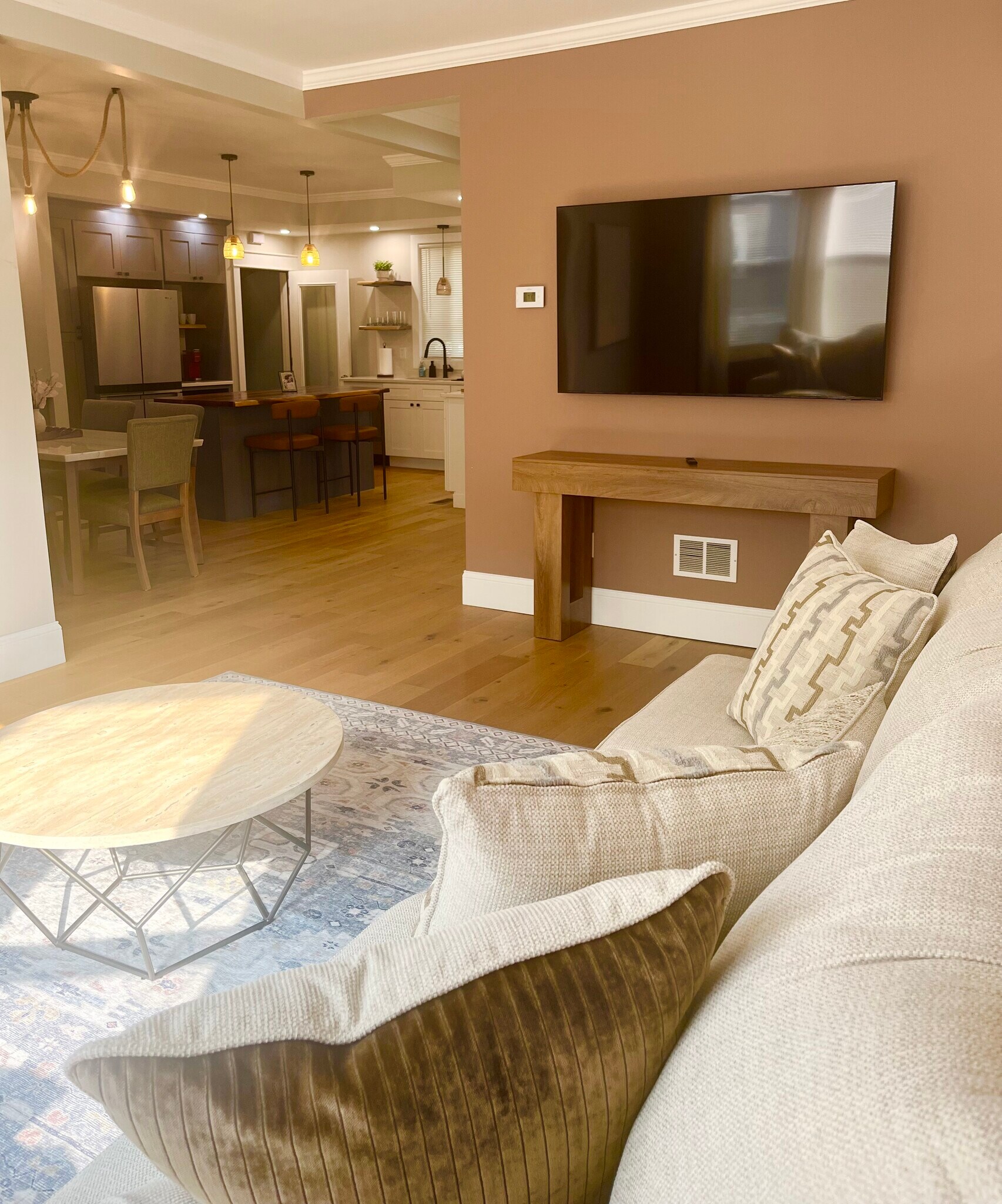 View of corner of living room looking toward the kitchen and dining area - 20 Summer St