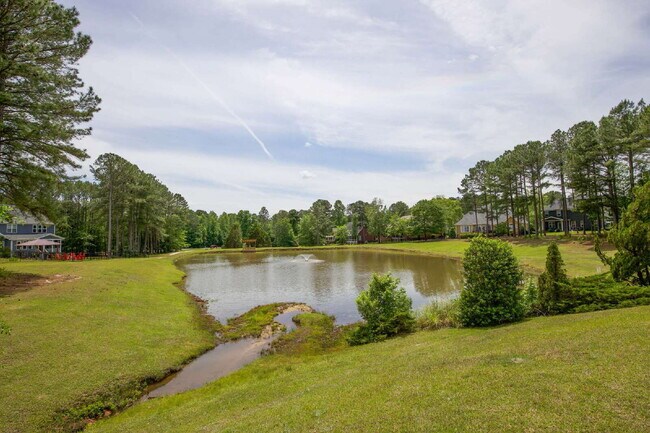 Building Photo - "Spacious 4-Bedroom Gem with 2.5 Baths at ...