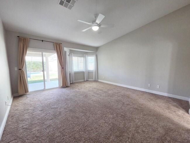 Building Photo - Gated Single-Story Home with Heated Pool, RV Parking & 3-Car Garage