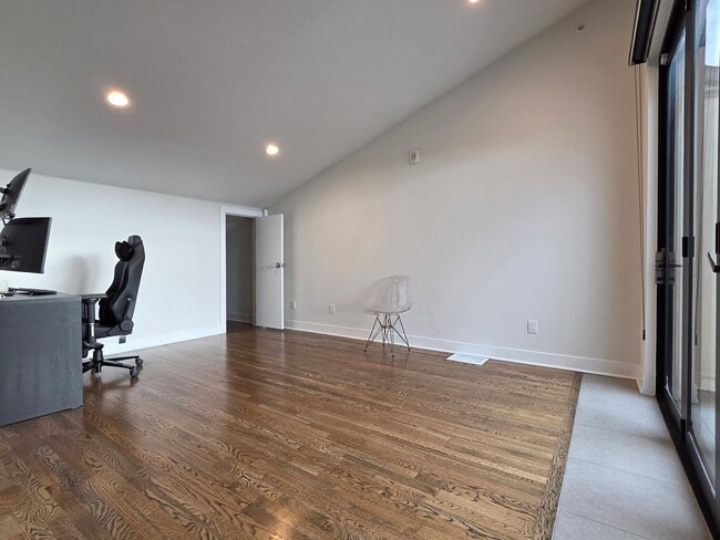 Building Photo - STUNNING 4-LEVEL TOWNHOME IN HIGHLANDS WITH SAUNA, 2-CAR GARAGE + AMAZING ROOFTOP DECK!