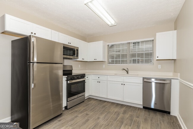 Building Photo - 5485 Denny Dr