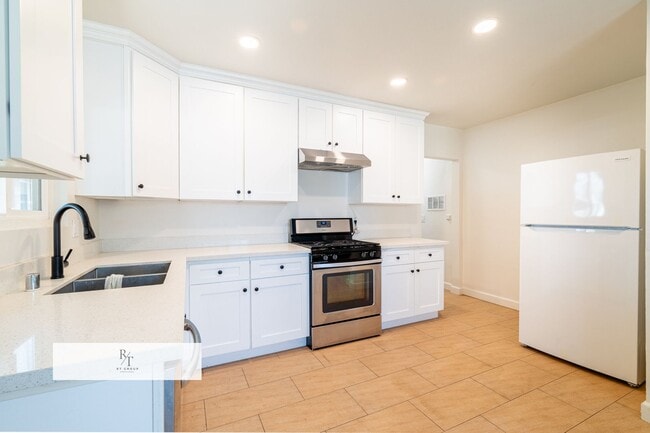 Building Photo - Remodeled House with Spacious Flat Lot - L...