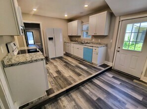 Building Photo - Fully Renovated 3-Bedroom Rental – New Appliances, Huge Yard, Garage, & Individual Room A/C!