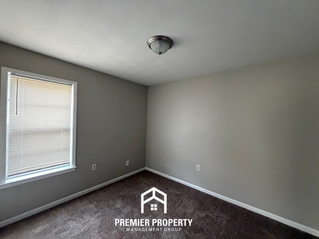 Building Photo - Spacious 4BR/2BA Home in Bartlett Cove | Brick Fireplace & Formal Dining