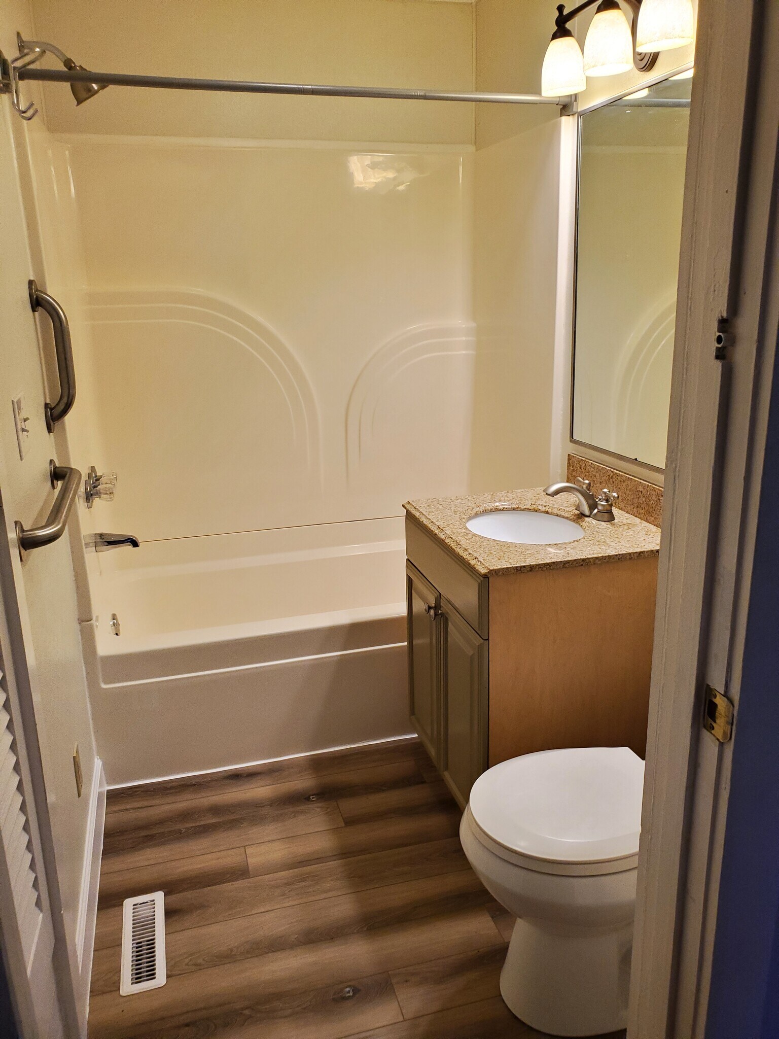 Both baths have tub/shower unit. Master has larger sink area and storage. - 358 E Lincoln Rd