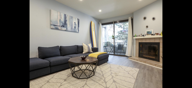 Living Room with access to patio - 8707 Falmouth Ave