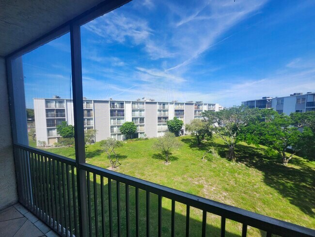 Building Photo - 8750 N Sherman Cir