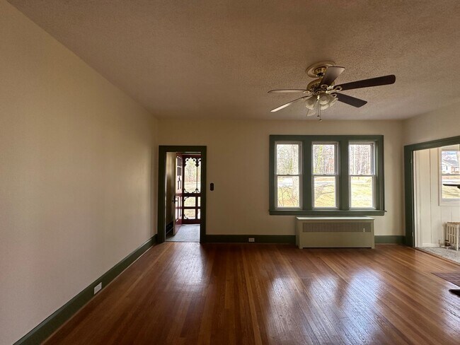 Building Photo - House in Bedford with Lot of Outdoor Space.