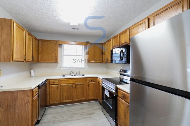 Building Photo - Move in before October 15th and get $100 O...